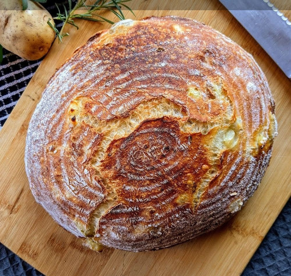 Loaded baked potato sourdough bread filled with warm savory flavors perfect for sandwiches, breakfast or a side for soup. Made by Nystrom Orchard in Worthington Minnesota.