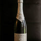 Bottle of champagne with a black background. Sold in the store of Nystrom Orchard in Worthington Minnesota.