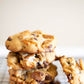Stack of chocolate, marshmallow, pretzel cookies on a cooling rack with a white background. Baked in the kitchen of Nystrom Orchard in Worthington Minnesota.