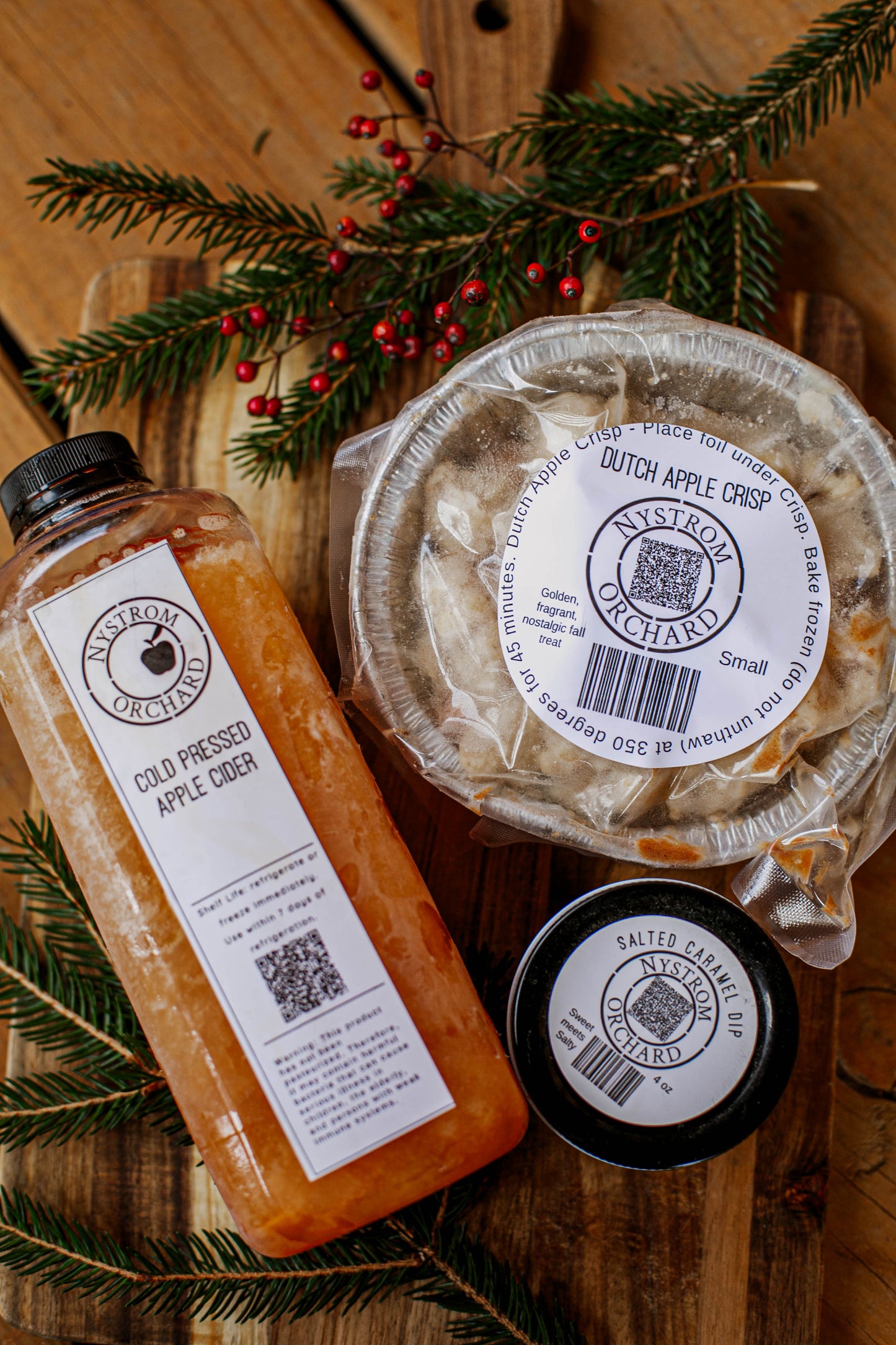 Frozen fresh pressed apple cider with a frozen dutch apple crisp and a salted caramel apple dip. Made in the kitchen at Nystrom Orchard in Worthington Minnesota.