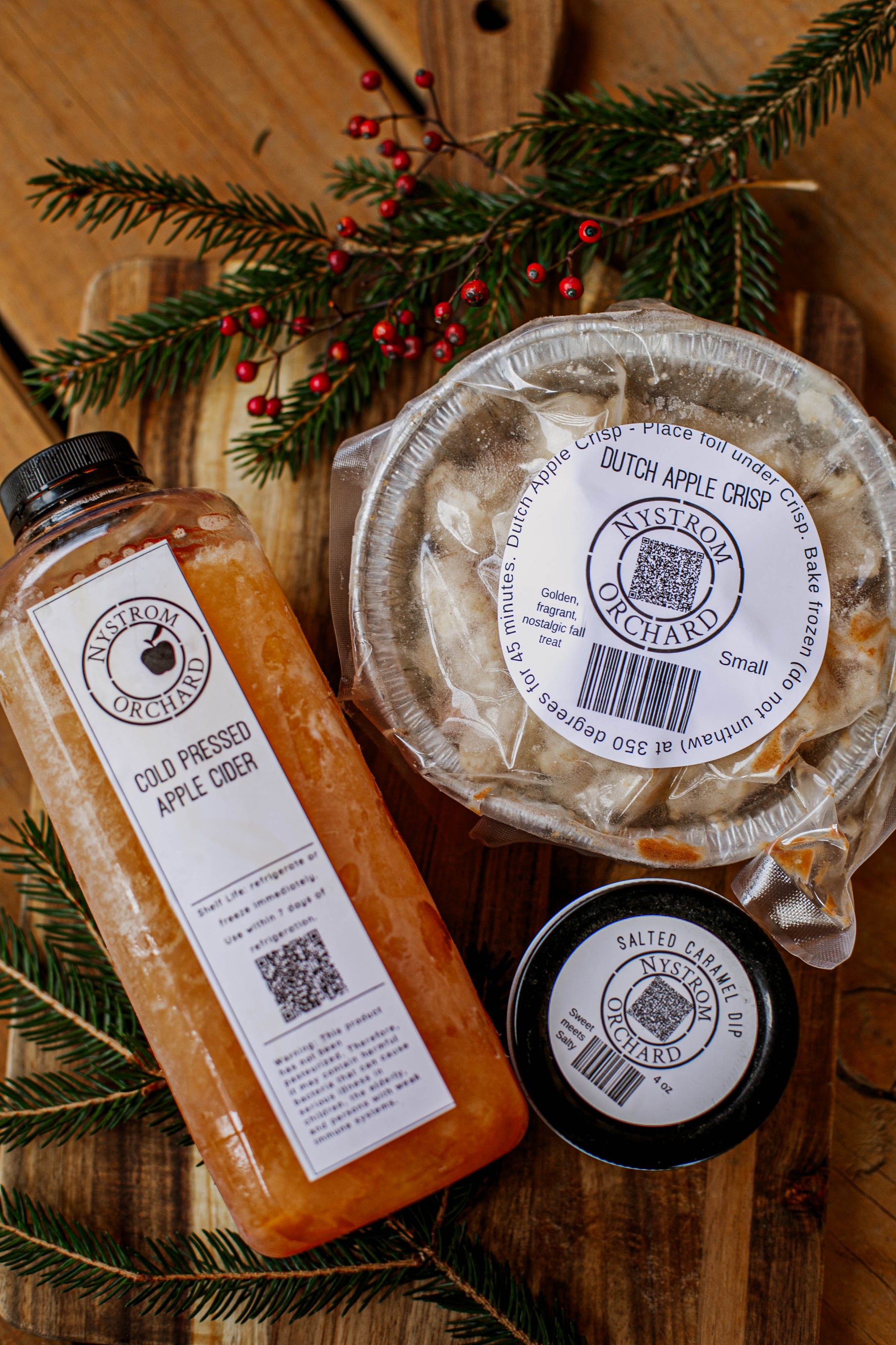 Frozen fresh pressed apple cider with a frozen dutch apple crisp and a salted caramel apple dip. Made in the kitchen at Nystrom Orchard in Worthington Minnesota.