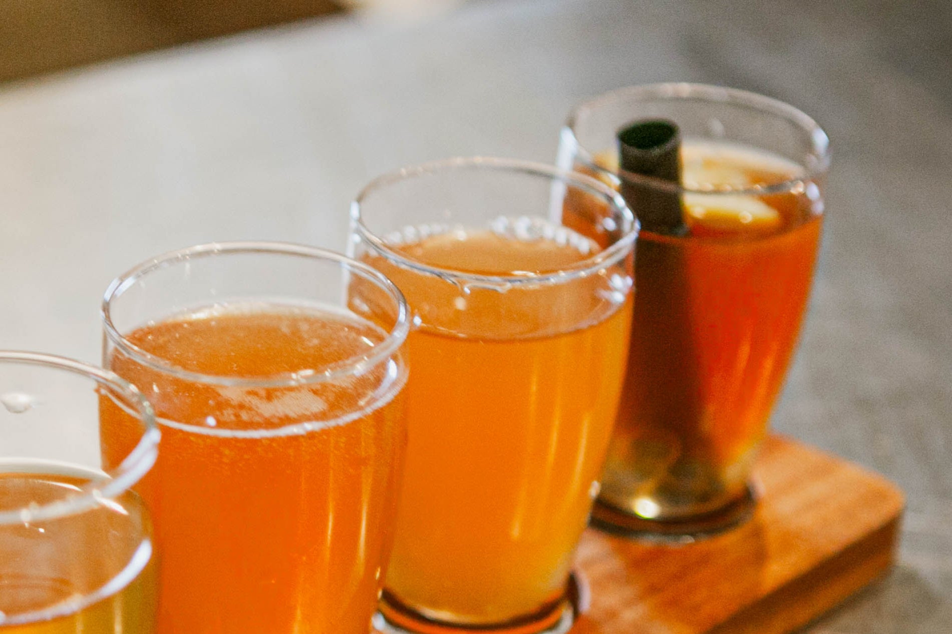 Close up of a cider flight. Pressed in the kitchen at Nystrom Orchard in Worthington Minnesota.