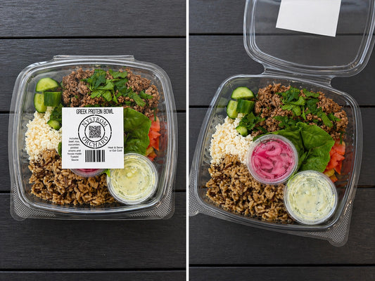 Protein bowl in a disposable plastic dish featuring seasoned rice, seasoned ground beef, pickled onions, lettuce, tomato, cucumber, fresh herbs and feta cheese. Served with a container of house made tzatziki sauce. Made by in the kitchen of Nystrom Orchard in Worthington Minnesota. 