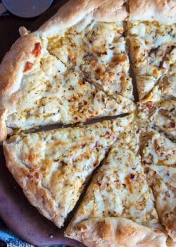 Sourdough Italian cheese bread slices on a baking stone. Baked in the kitchen at Nystrom Orchard in Worthington Minnesota.