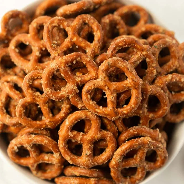 Close-up of seasoned pretzels in a white bowl. Made in the kitchen of Nystrom Orchard in Worthington Minnesota. 