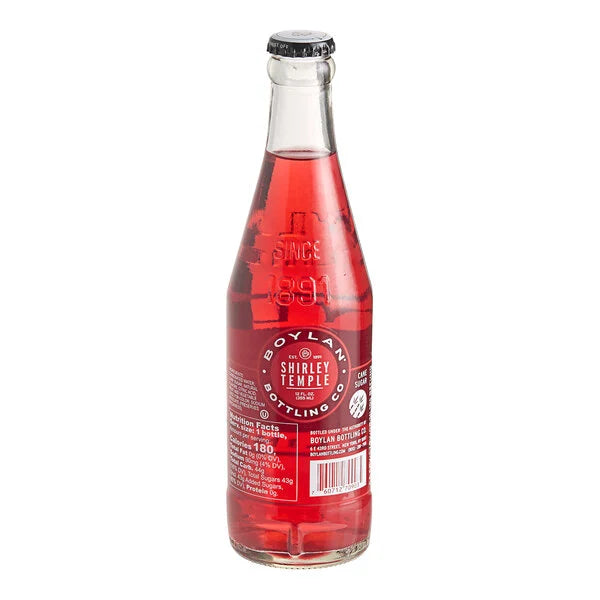 Glass bottle of Boylan bottling Co Shirley Temple (non-alcoholic) flavored soda on a white background. Sold in the store of Nystrom Orchard in Worthington Minnesota.