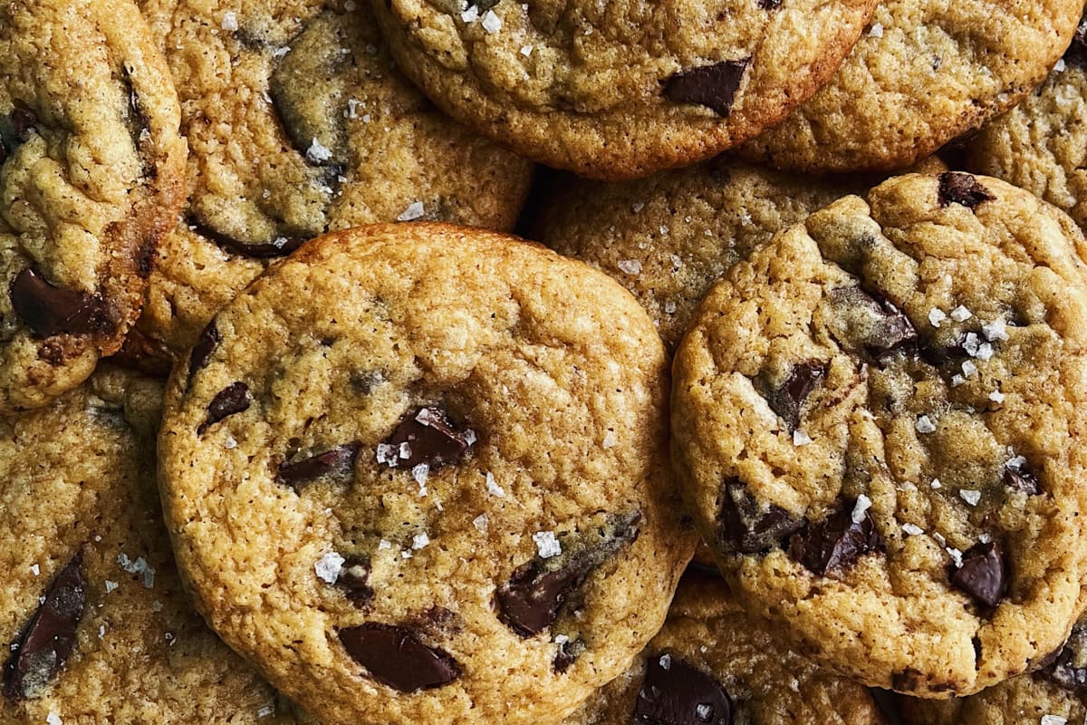 Close-up of sourdough chocolate chip cookies with chocolate chunks and sea salt. Made in the kitchen of Nystrom Orchard in Worthington Minnesota.
