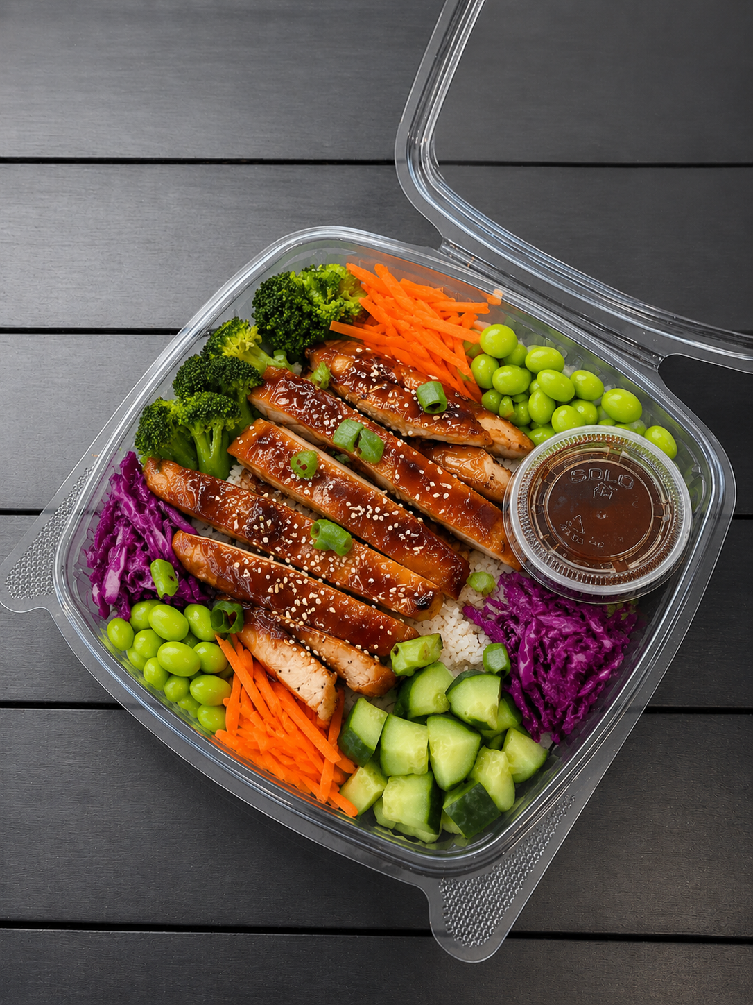 Fresh Terriyaki Chicken protein bowl filled with plenty of rice, chicken and fresh vegetables from Nystrom Orchard in Worthington Minnesota